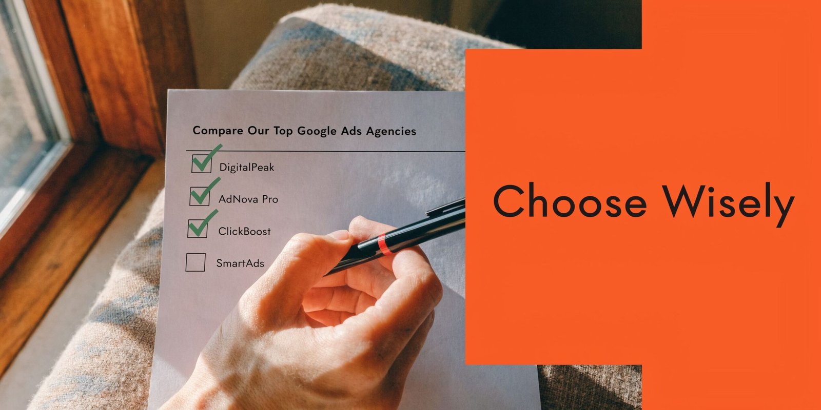 A hand holding a pen checking off top Google Ads agencies on a printed selection list.
