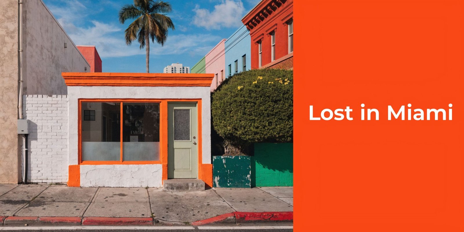A colorful storefront with orange trim on a sunny street in a vibrant Miami neighborhood.